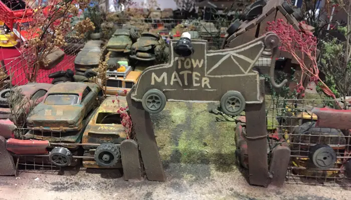 A Disney Pixar Cars collector diorama depicting Mater's junkyard at the 2017 Mexico Diecast Convention.